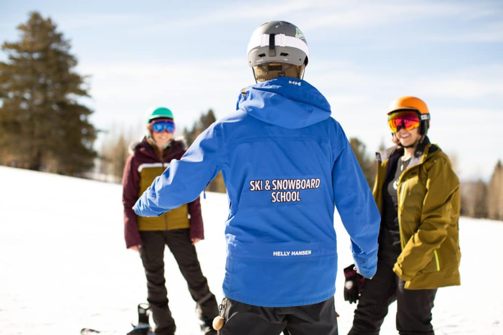 Ski instructor during ski lesson at Arizona Snowbowl.