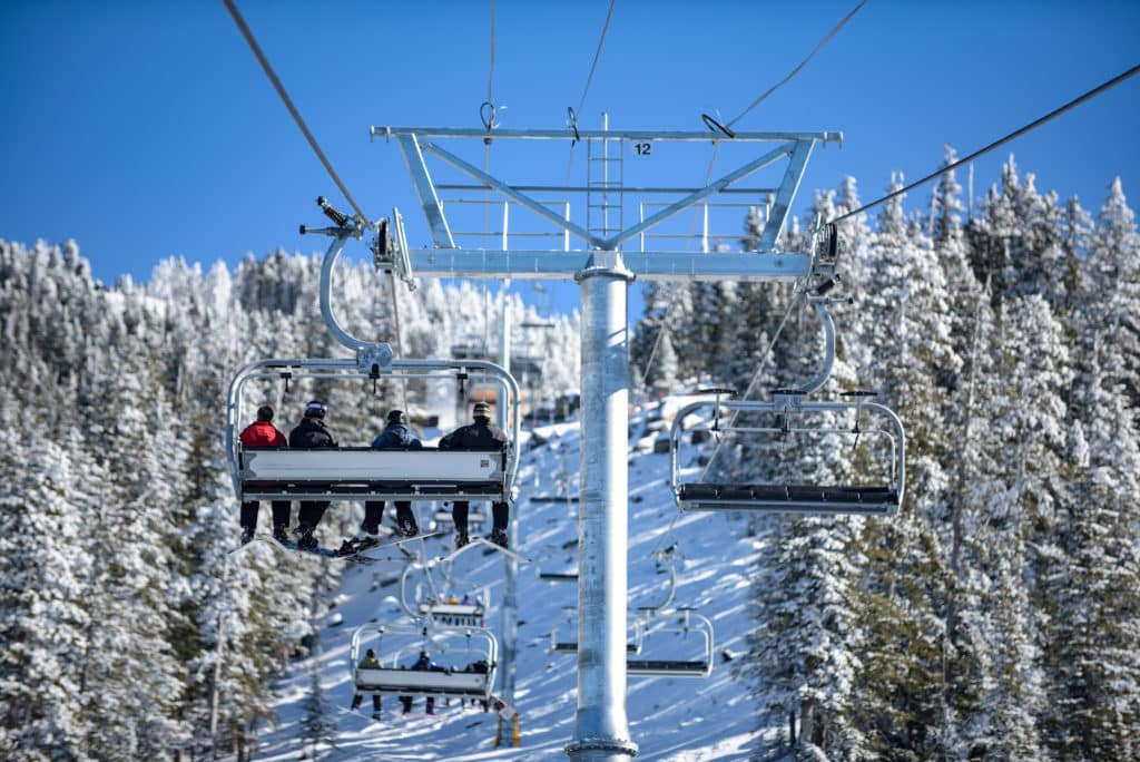 Riders on Grand Canyon Express chairlift.