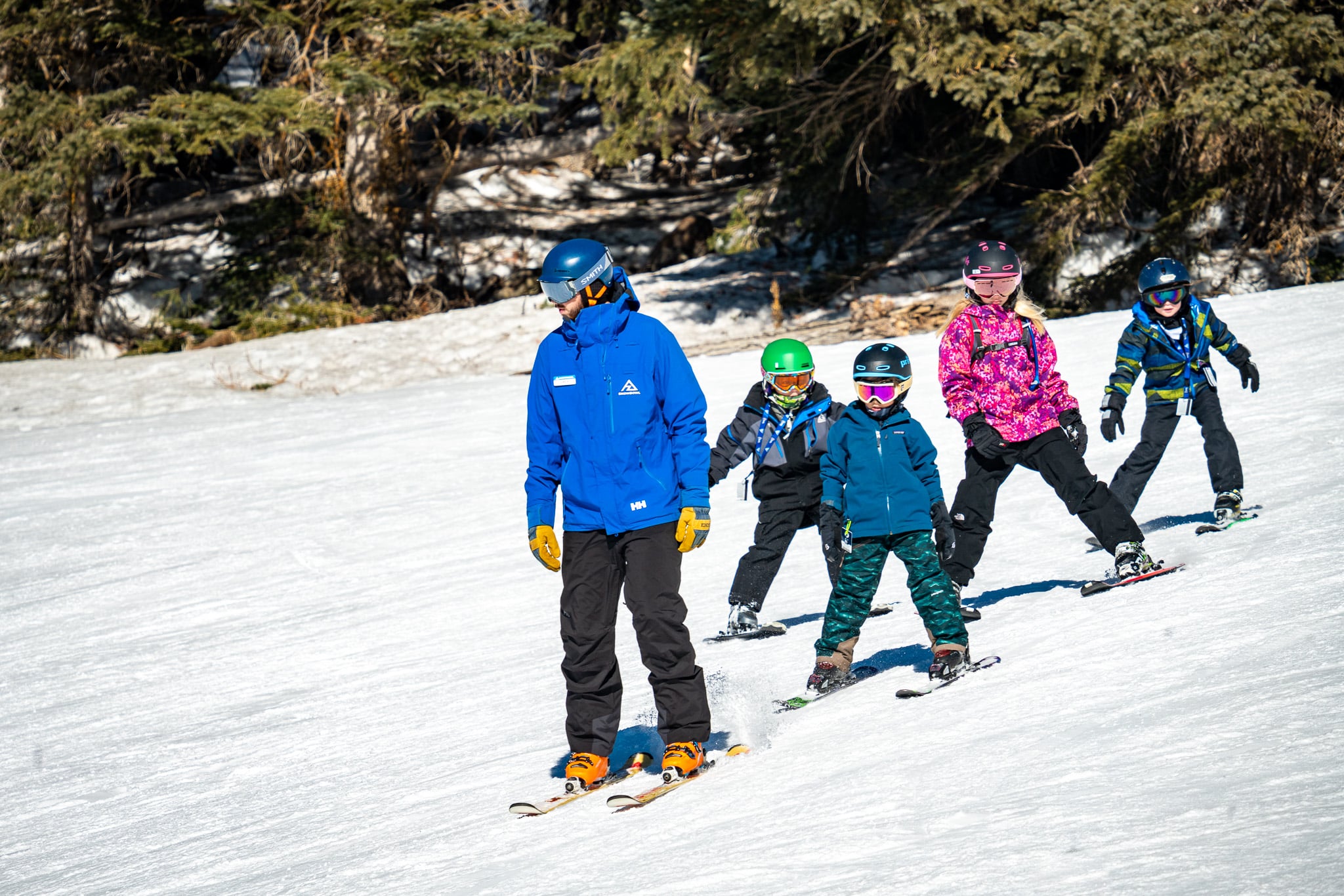Children in ski lesson.