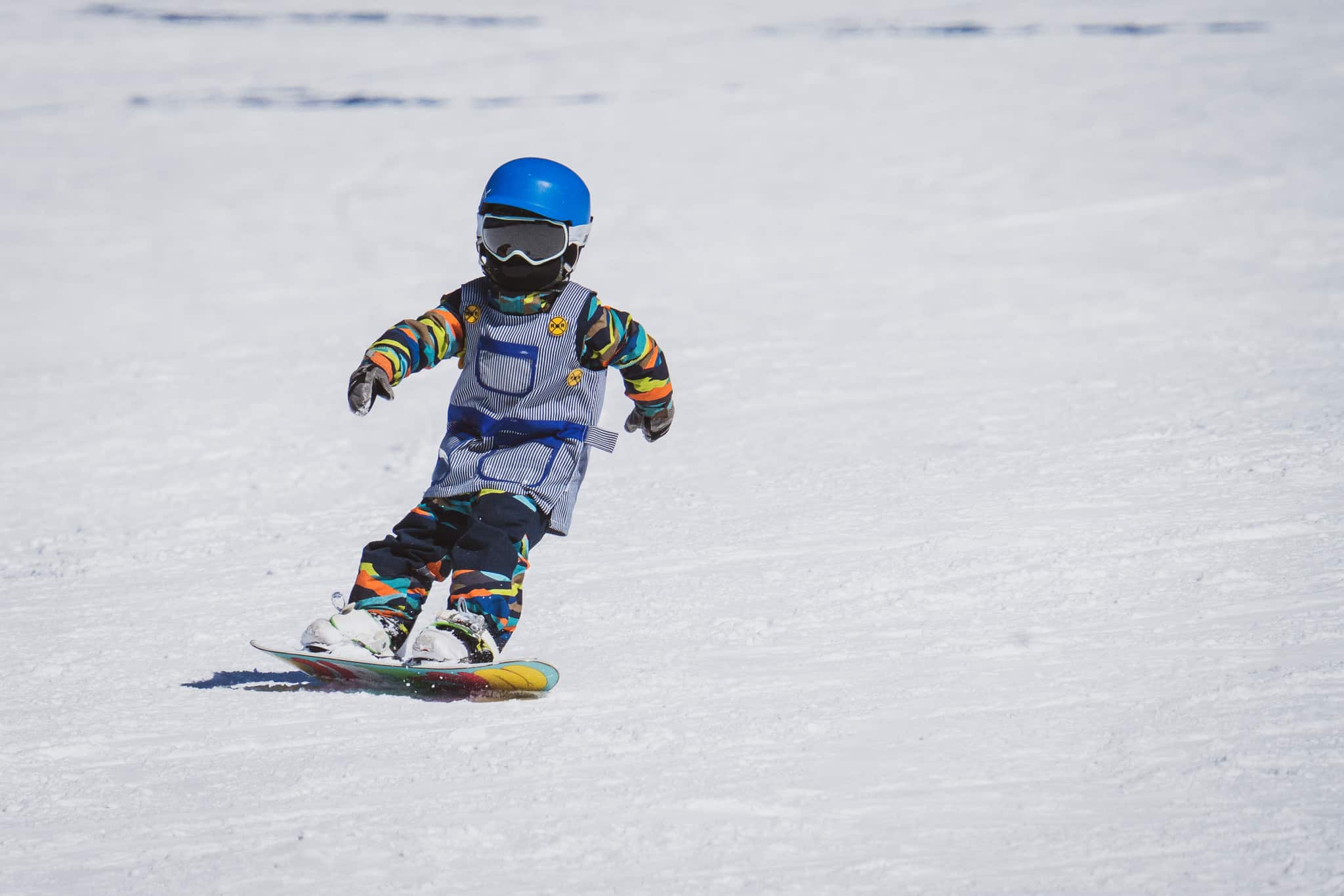 Child snowboarder.
