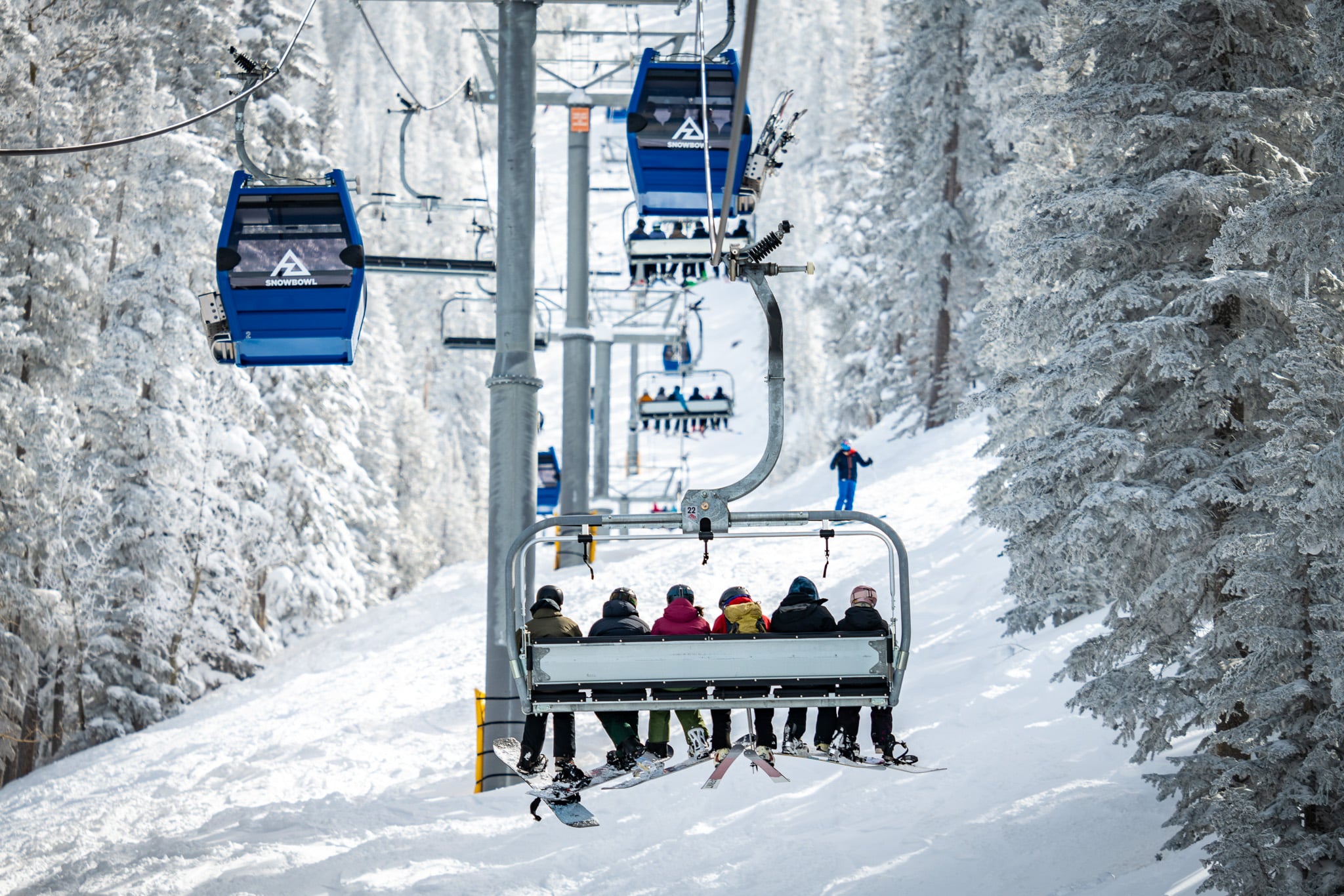 Skiers and Riders on the Arizona Gondola