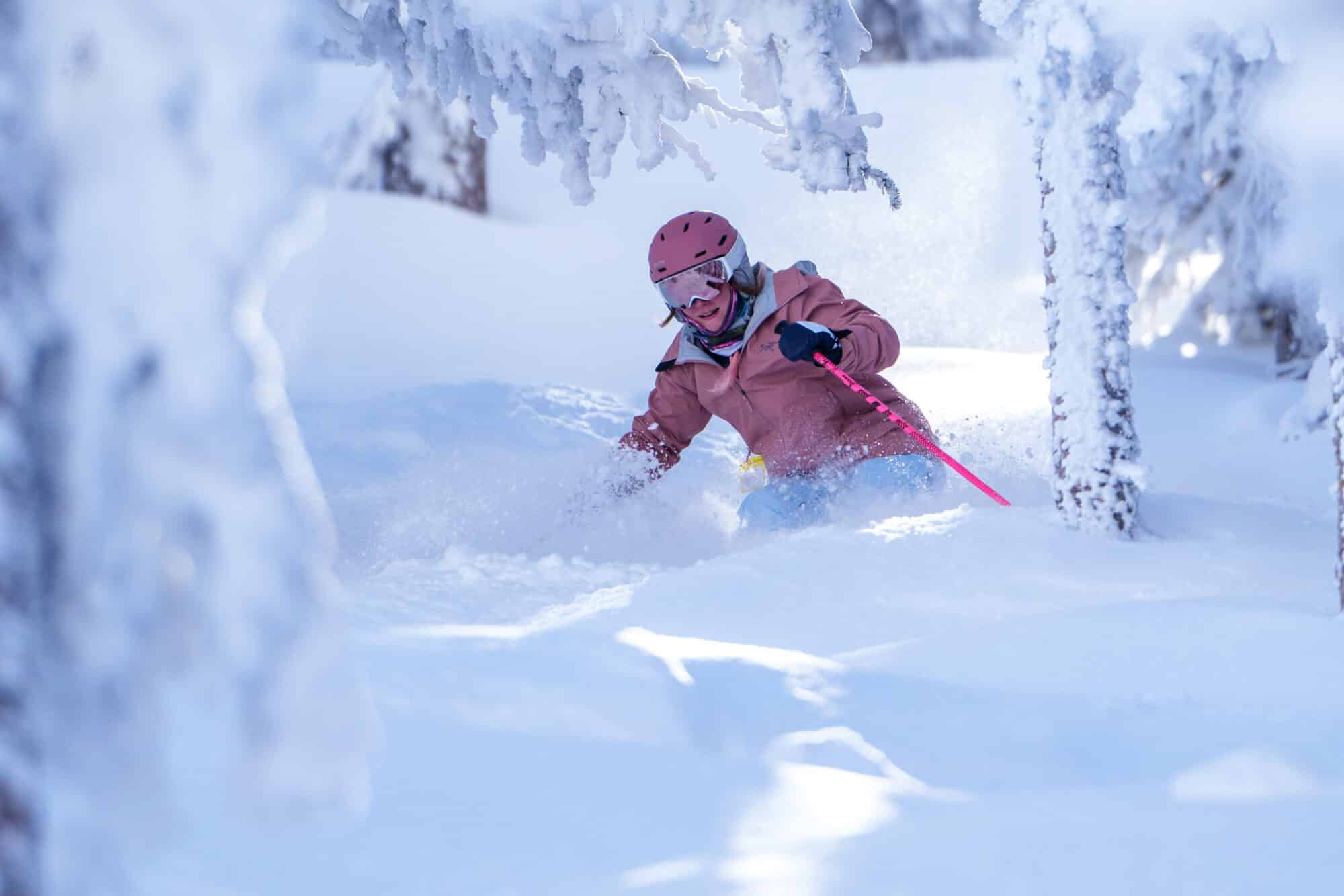 Female Skier enjoying fresh snow