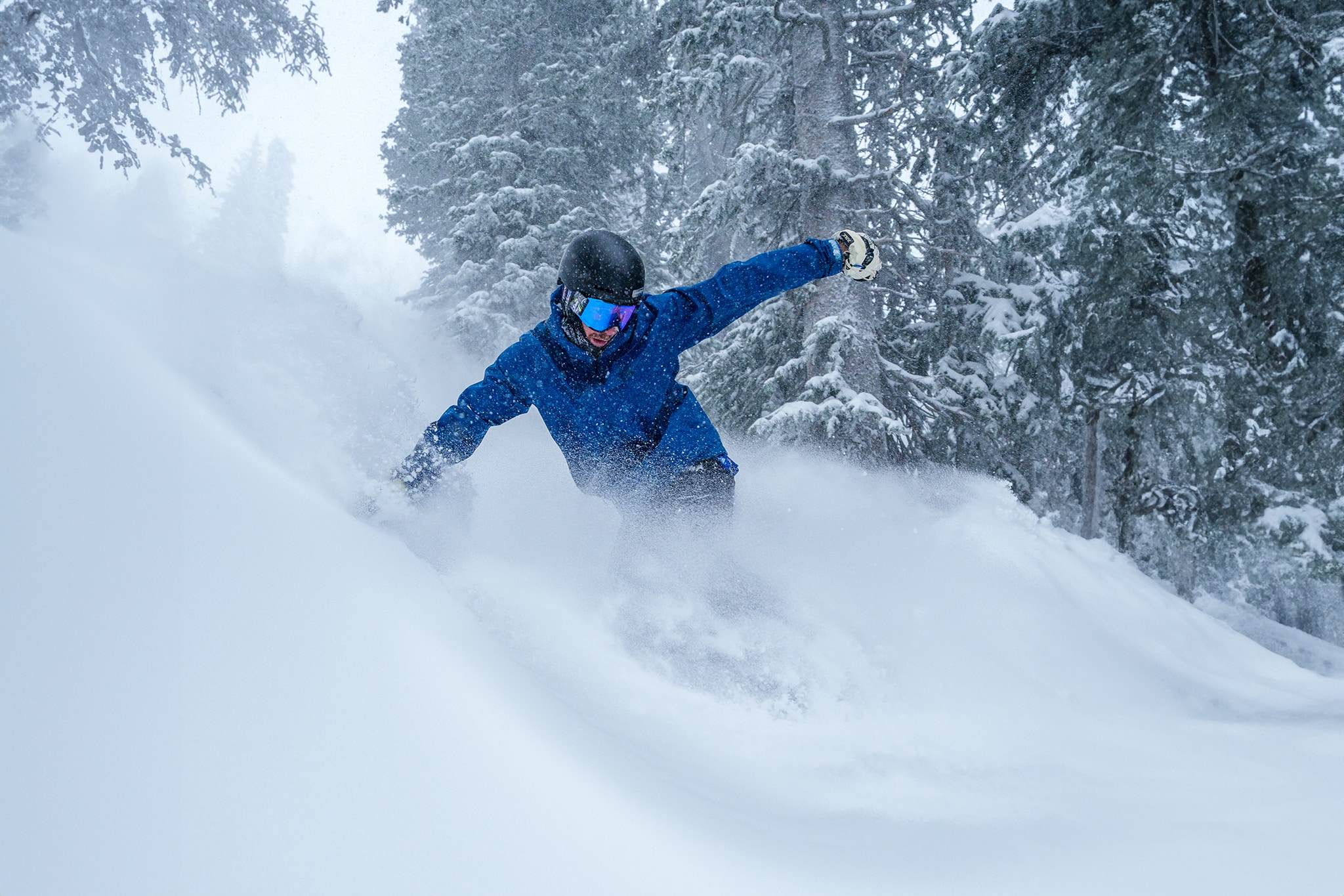 Snowboarder Slashing Through Fresh Snow