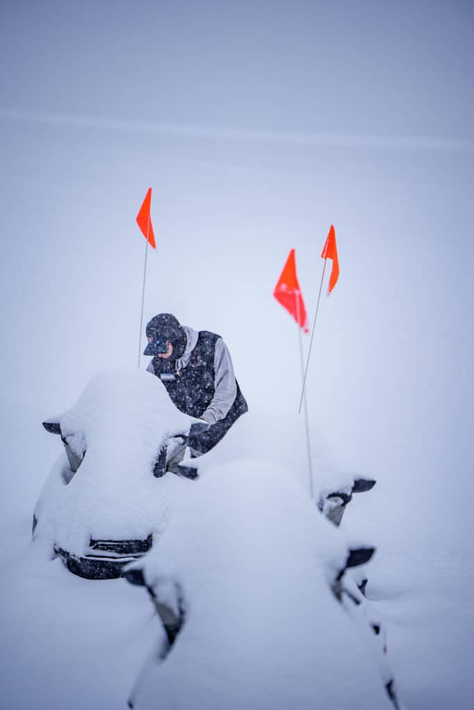 Lift Mechanic on a Snowmobile