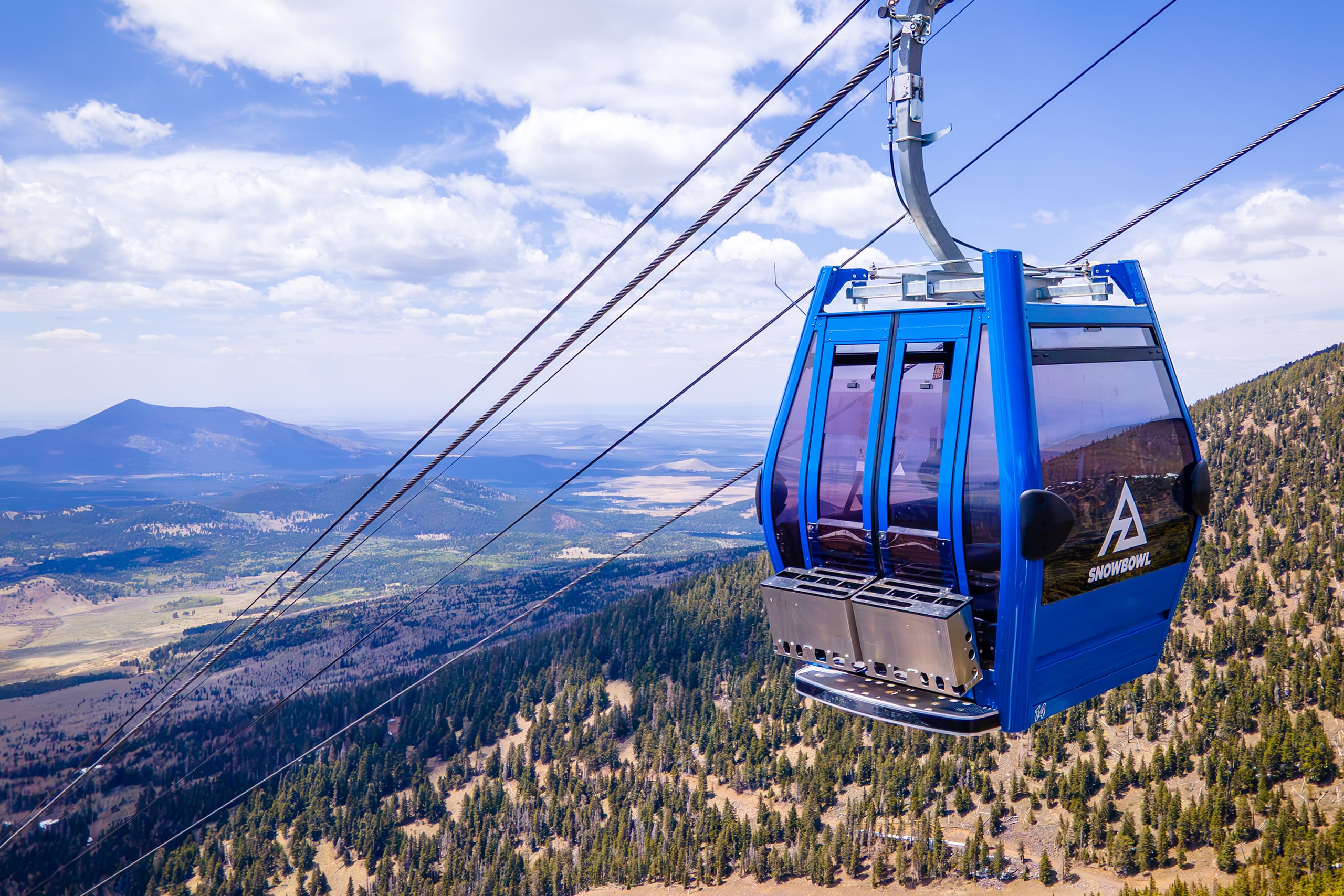 Gondola Cabin Rising Above Arizona
