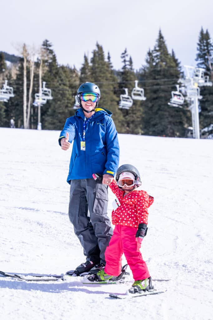 Father and daughter on skis