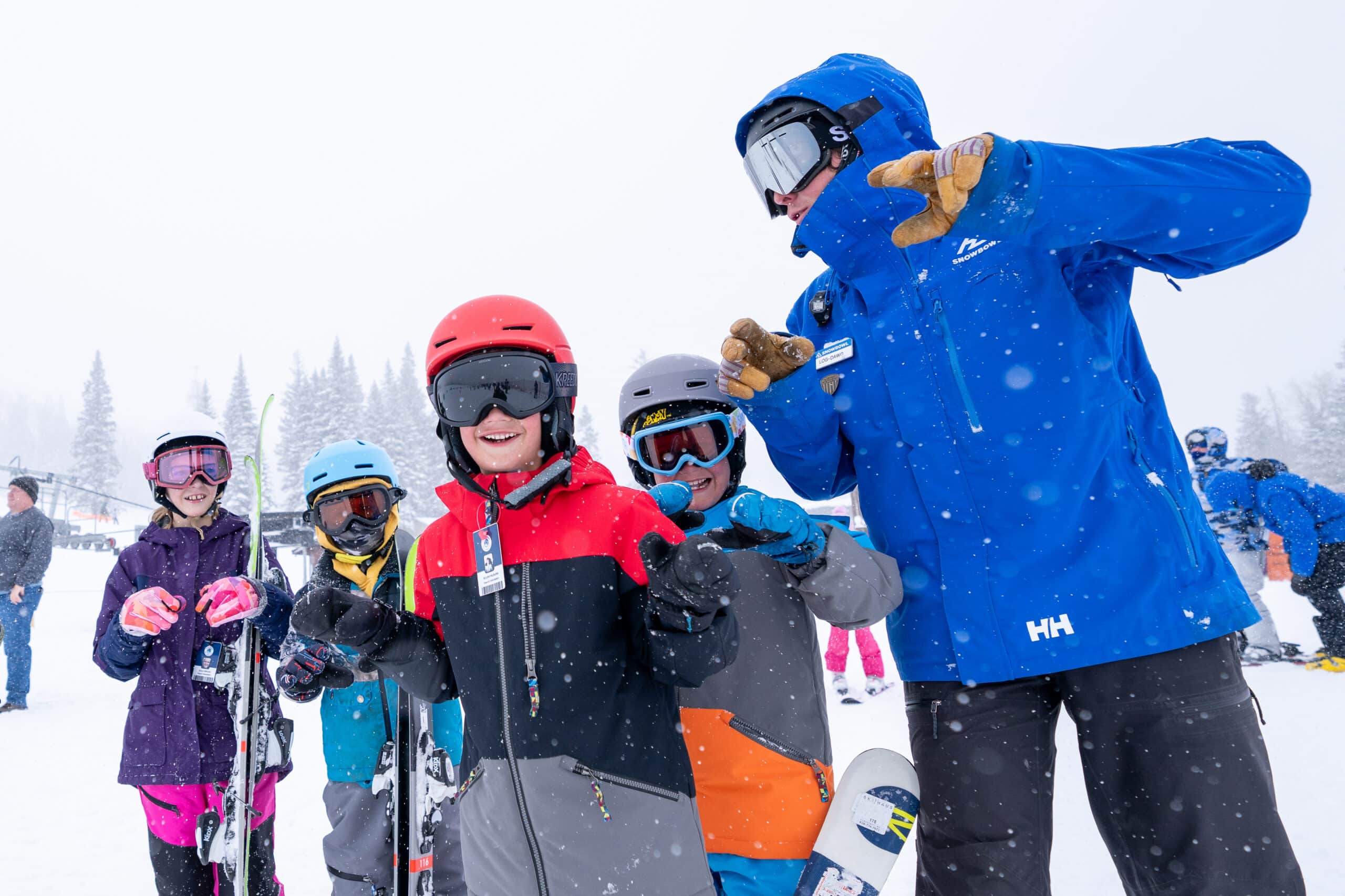 Ski Instructor teaching a group of kids