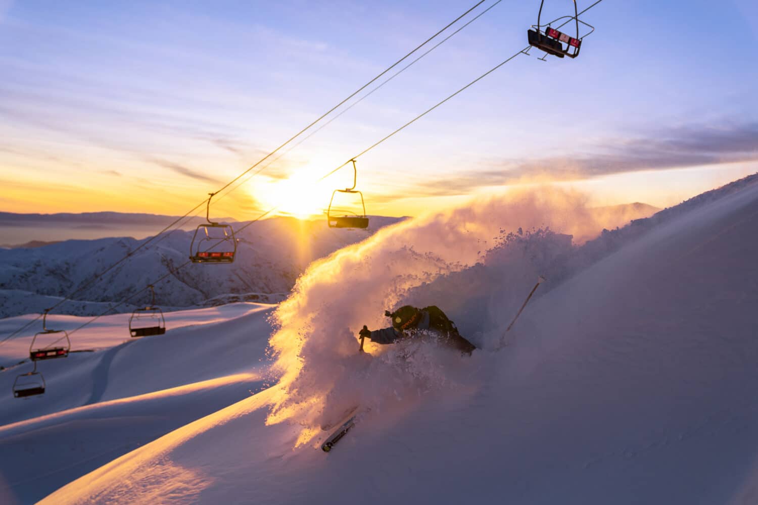 Skier slashing powder at La Parva, Chile