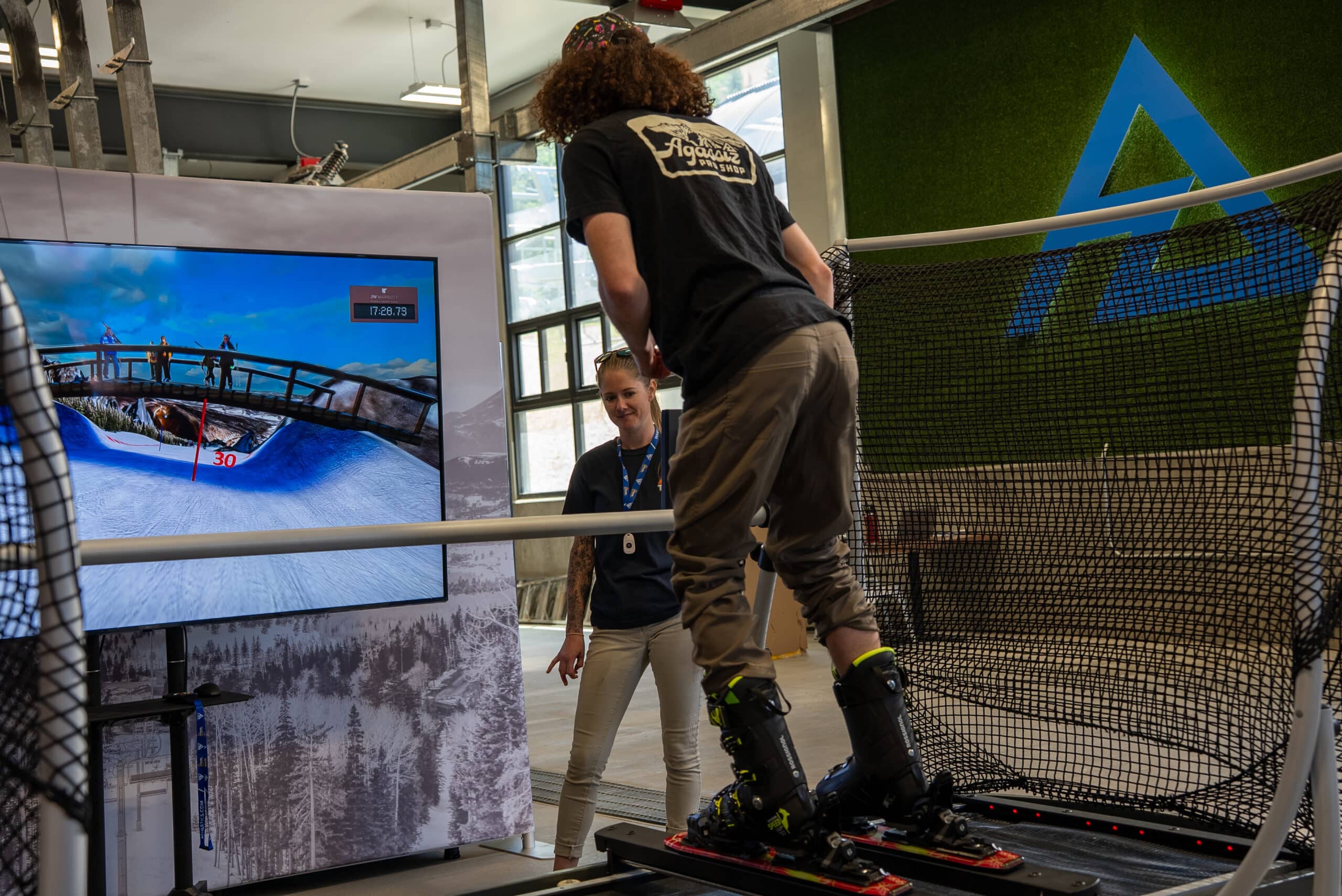 A guest trying out the VR Skiing machine