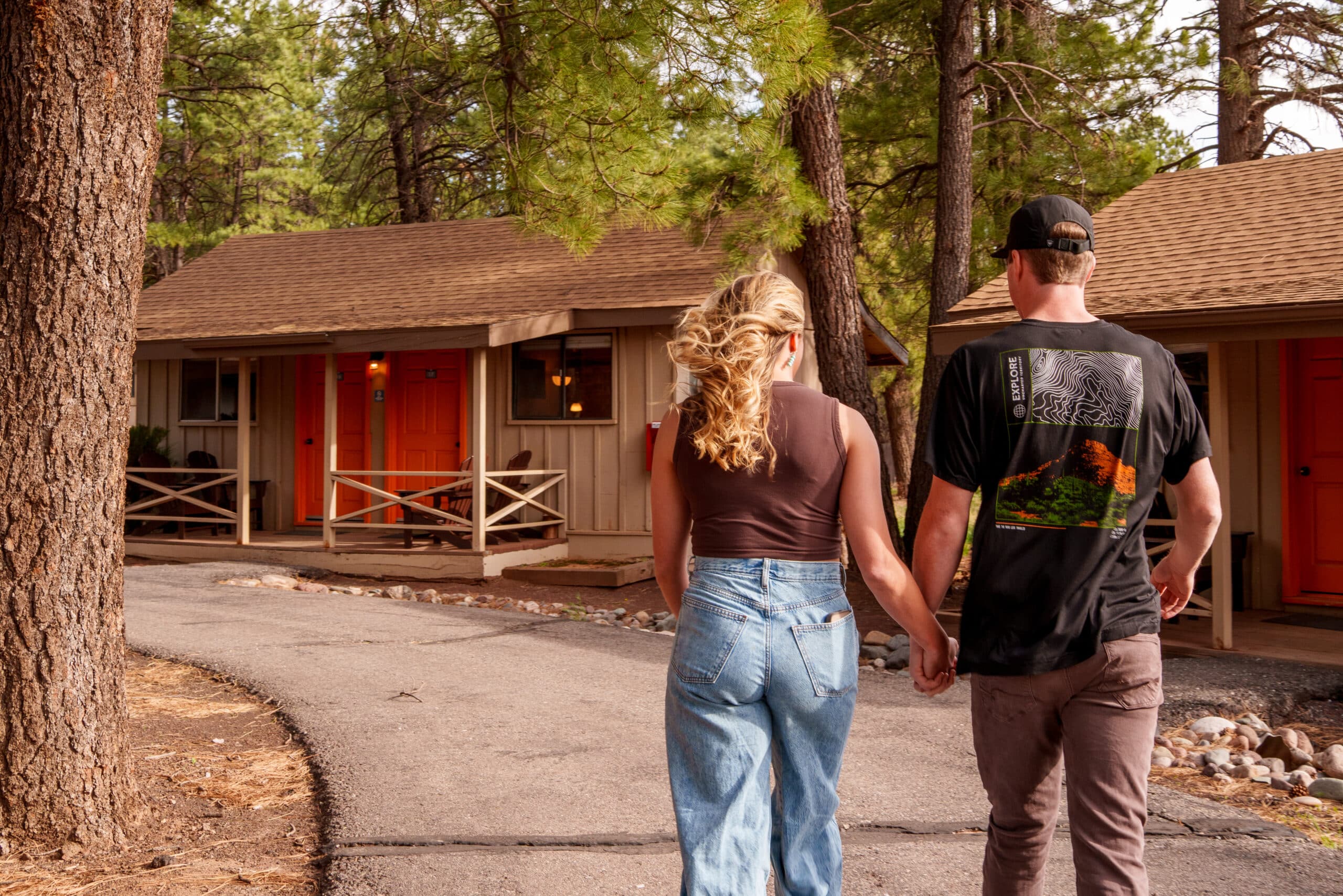 A couple at Basecamp at Snowbowl going to their cabin