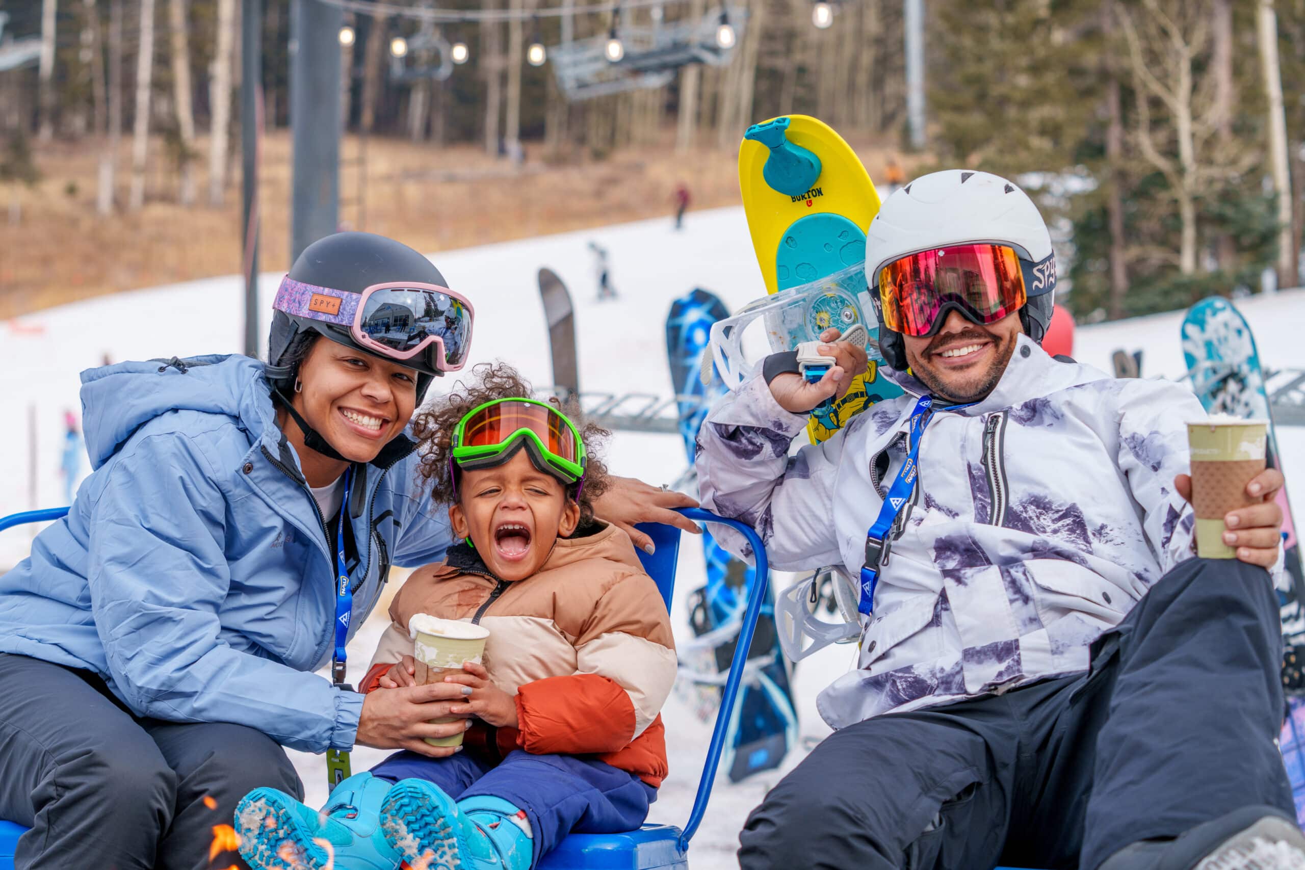 Family of 3 at Fremont with hot cocoa