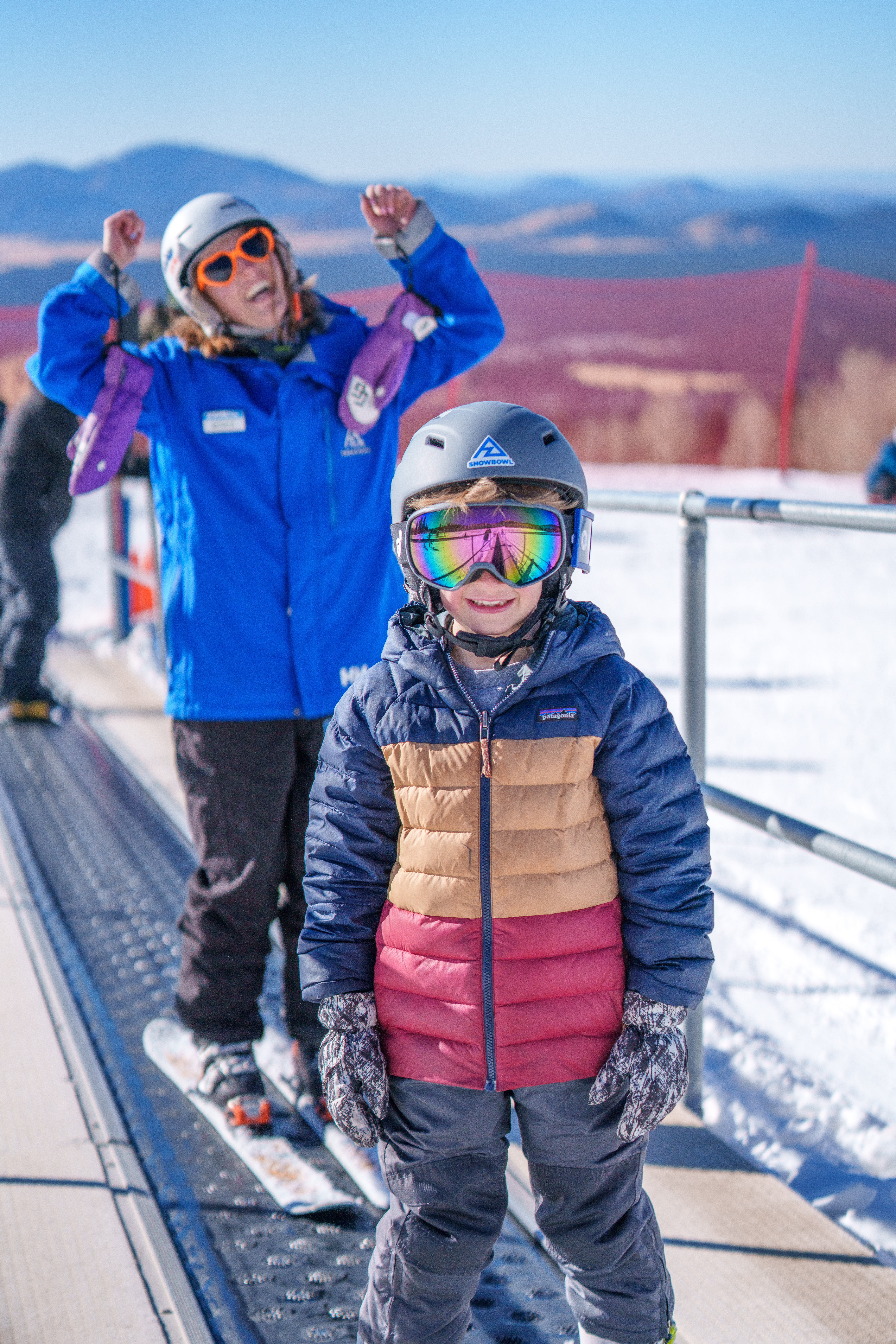 Child and instructor on the Little Spruce lift
