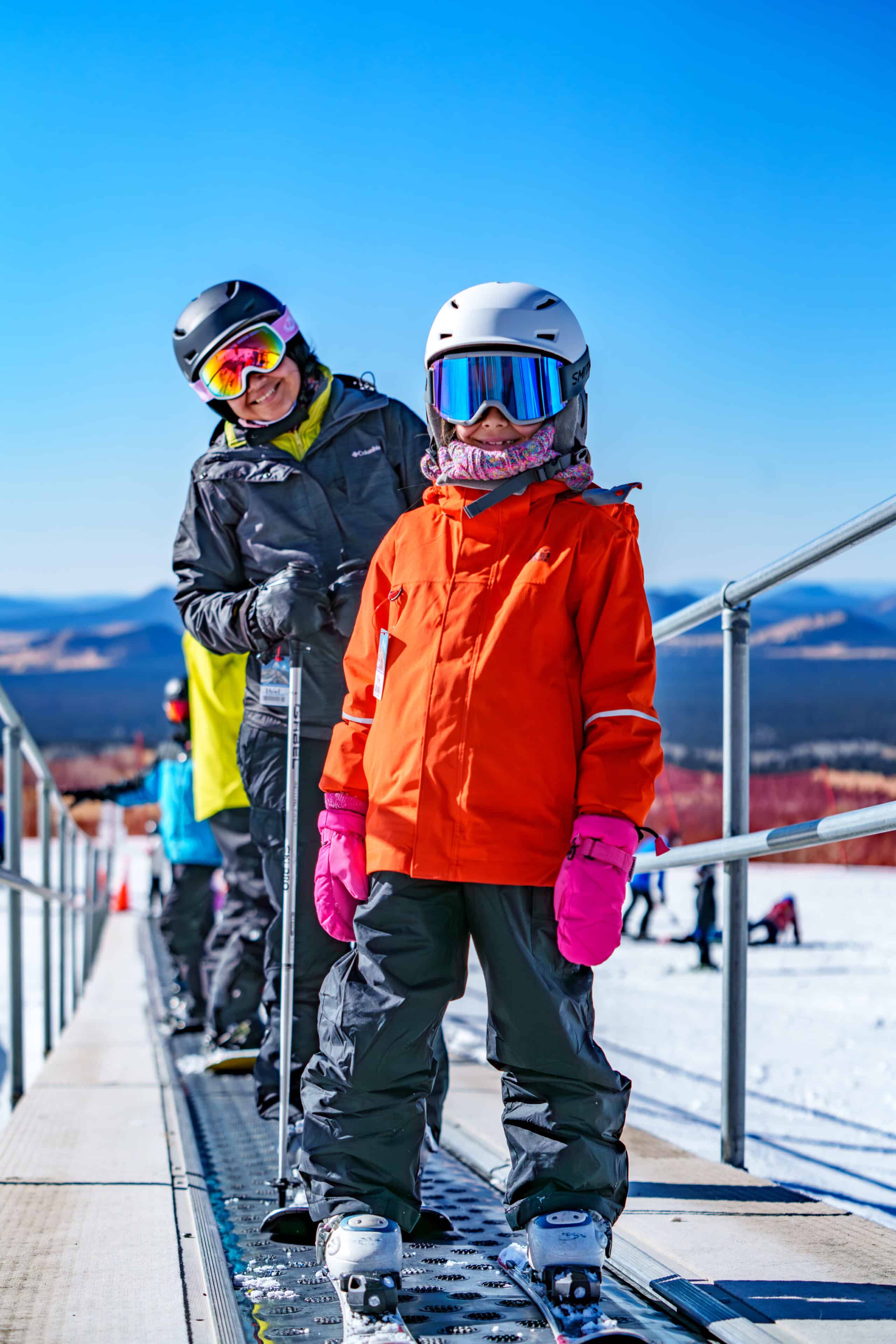 Child and parent on the Little Spruce lift