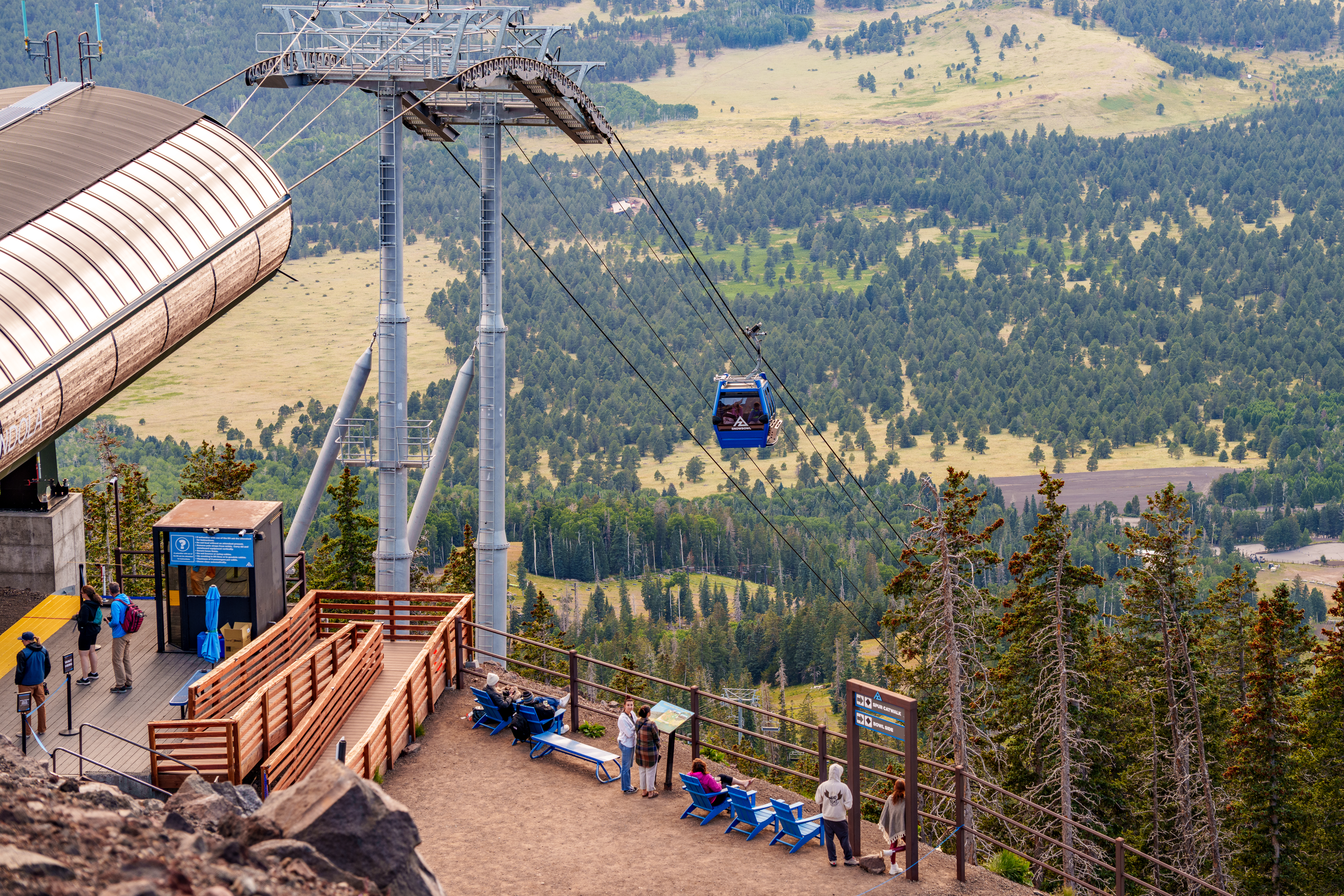 View from the top of the Arizona Gondola, guests at the top taking in the view