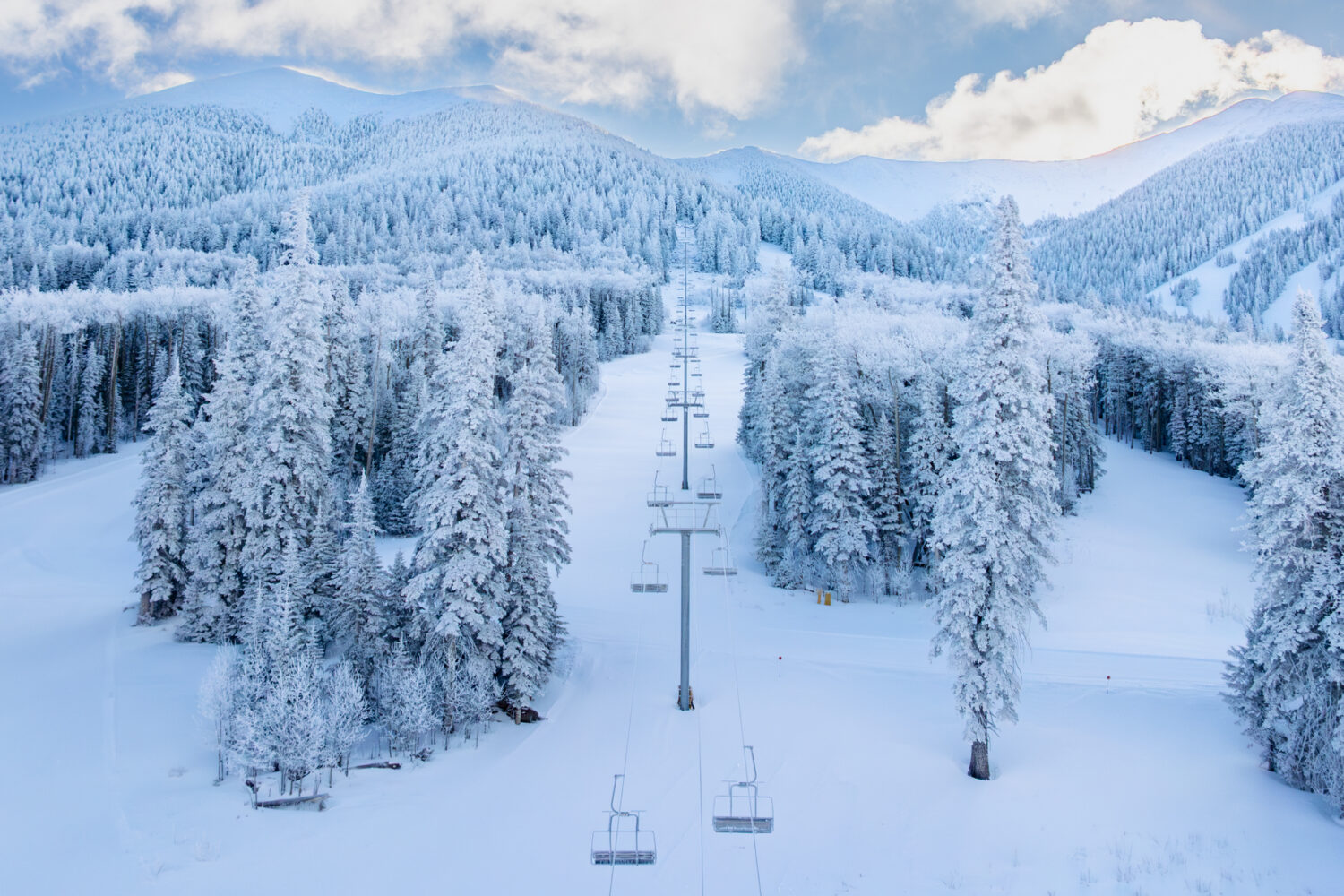 Aerial view of Snowbowl covered in snow above Hart Prairie lift