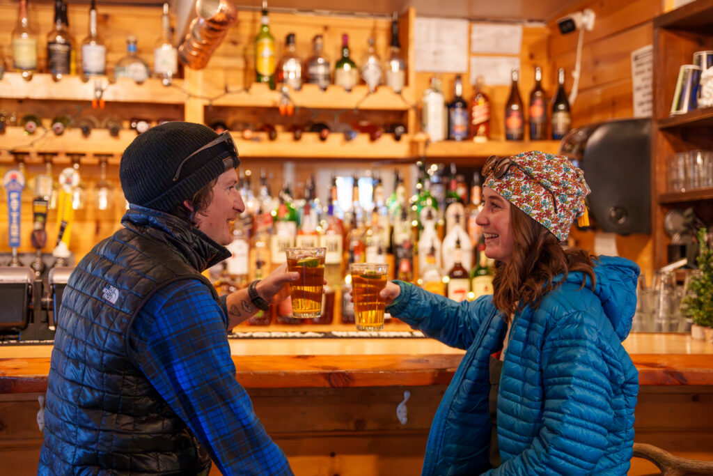 Two guest enjoying the bar at Basecamp Restaurant