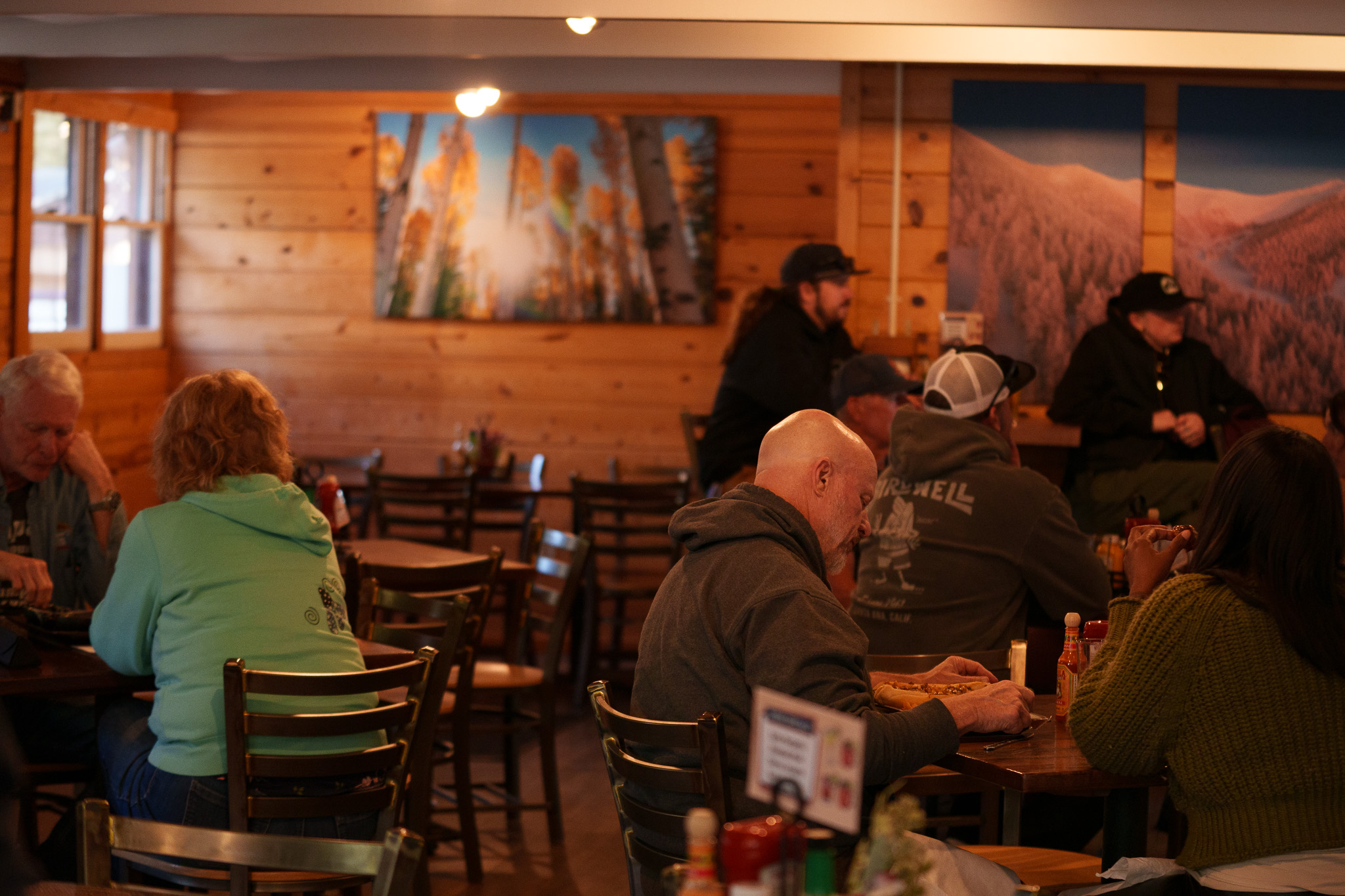 People eating and gathering at basecamp restaurant